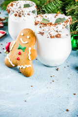 Ideas for Christmas drink, gingerbread martini cold cocktail. with gingerbread cookies, xmas tree and decorations
