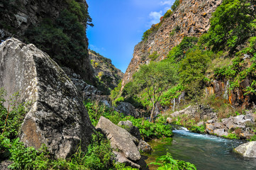 Fototapeta na wymiar Dashbashi Canyon, Khrami river and Waterfall in Tsalka region, Georgia