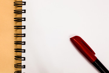 Design business concept Empty template copy space text for Ad website isolated. Marker over open spiral notebook white page communicating ideas messages