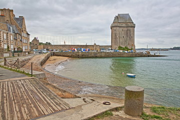 Solidor Tower located in the estuary of the river Rance in Saint Servan with Saint Pere beach in...