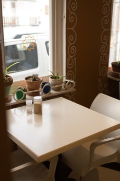 Table and chairs in cafe