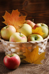 seasonal apple with autumn leaves