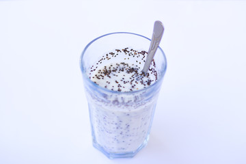 Chia seeds are drunk with airan from a glass.