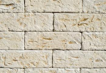 New facade decorative  tiles on wall  imitating stone closeup