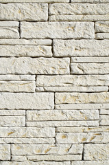 New facade decorative  tiles on wall  imitating stone closeup