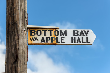 Direction arrow to the Bottom Bay - paradise beach on the Caribbean island of Barbados. Pointer...