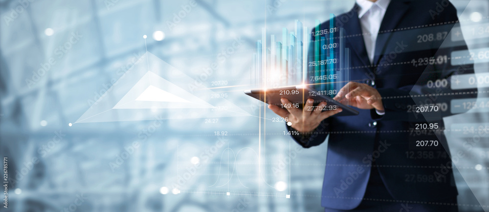 Aufkleber Businessman using tablet analyzing sales data and economic growth graph chart.  Business strategy. Abstract icon. Digital marketing