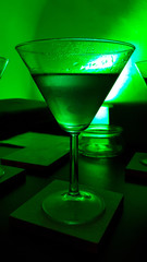 Gin cocktail with green lighting