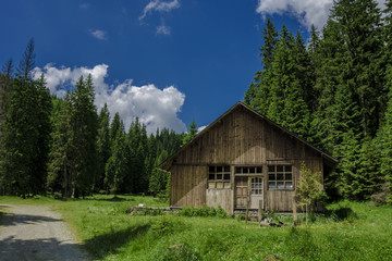 Mountain Cabin with Blue Sky