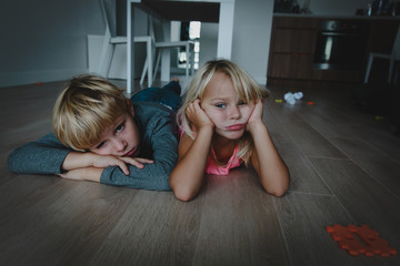 kids bored at home, stressed tired exhausted boy and girl tired being inside - obrazy, fototapety, plakaty