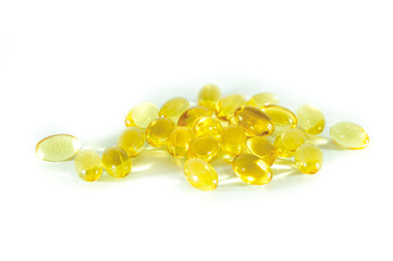Fish oil, evening primrose, omega 3, omega 6, omega 9, vitamin D, vitamin A Food supplement capsules, softgels close up