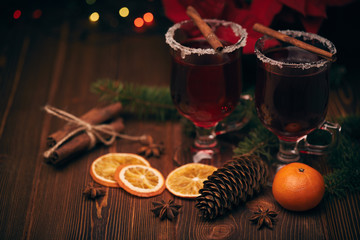 Glasses of mulled wine on wooden table