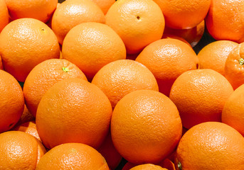 Fresh oranges overlapped
