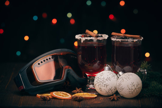Glasses of mulled wine on wooden table