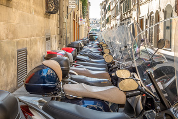 Italian mobility, motor scooters in a row