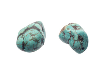 Raw turquoise gemstone rock isolated on white