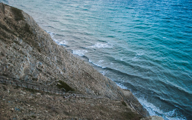 Fototapeta na wymiar view of the blue sea from the cliff, landscape, cold sea