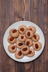almond cookies on small plate