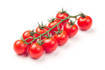Cherry tomatoes isolated over white background