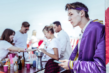 Have idea. Serious brunette raising eyebrows while creating plan of action