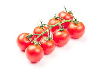 Cherry tomatoes isolated over white background