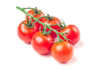 Cherry tomatoes isolated over white background
