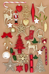 Christmas old fashioned retro ornaments and decorations with food and winter flora on wrapping paper background. Festive card for the holiday season. Top view.