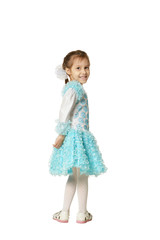 Portrait of little girl in a blue dress on white background