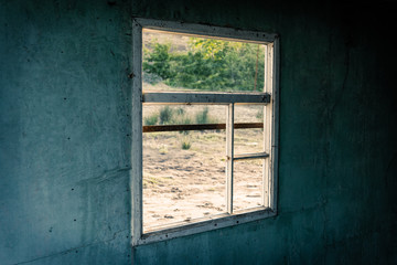 Window of an abandoned wooden house