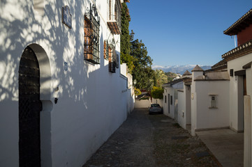 Alleyway with Sierra Nevada Backdrop in Historic Center of Granada, Spain