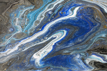 Fototapeta premium Gold marbling texture design. Blue and golden marble pattern. Fluid art.