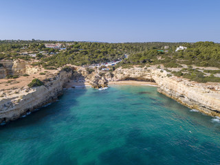 Aerial seascape in Praia Albandeira, beach destination of Algarve coast. Portugal.
