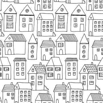 Hand drawn seamless pattern with doodle houses, vector background with cartoon town