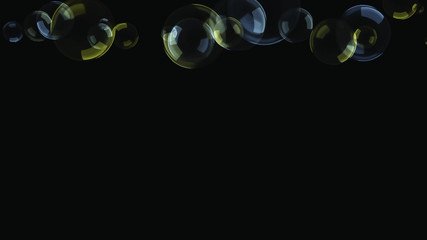 Background with a variety of multi-colored translucent soap bubbles.