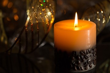 lit holiday candle