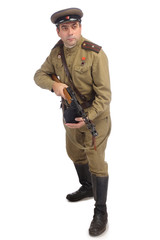 Major of soviet army with mashine gun looking up