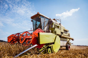 Fototapeta na wymiar Combine harvesters Agricultural machinery. The machine for harvesting grain crops.