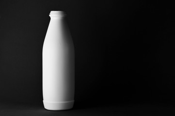 White plastic bottle - light and shadow