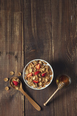 Breakfast of oatmeal with strawberries.