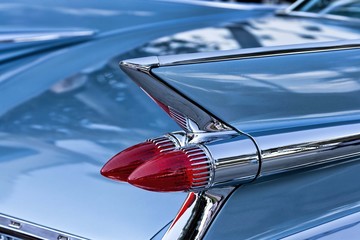 Retro auto styling with rocket fins and pointed red tail lights © David