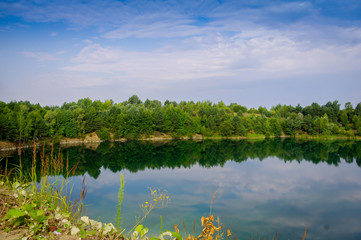 blue lake with tourists