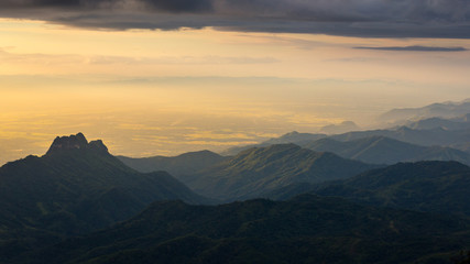 Fototapeta na wymiar Morning sunshine with foggy mountains. View of beautiful mountaints.