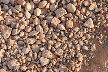 big pile of rocks and boulders piled with beautiful sunset light,