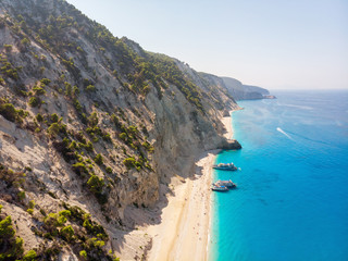 Tourist ship on the Egremni beach, Lefkada, Greece.