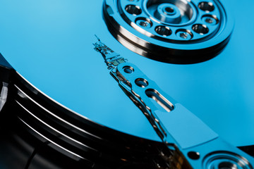 Disassembled hard drive from the computer, hdd with mirror effect. Opened hard drive from the...