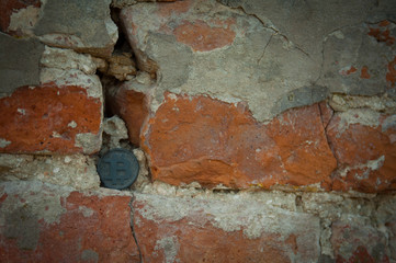 Bit Coin on old brick wall