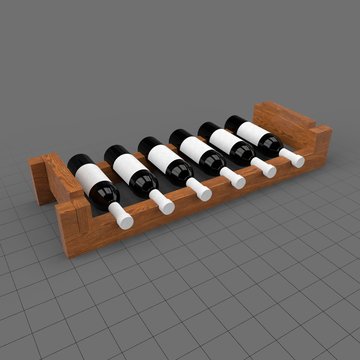 Wine bottles on wooden stand