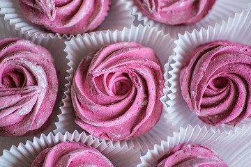 Pink home-made marshmallows with black currant.
