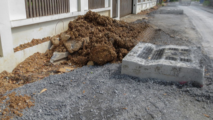 dirty road under construction and drain pipe at Thailand