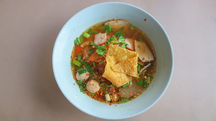 White Rice Noodle with Sliced Pork and Pork Ball in Hot and Sour Soup